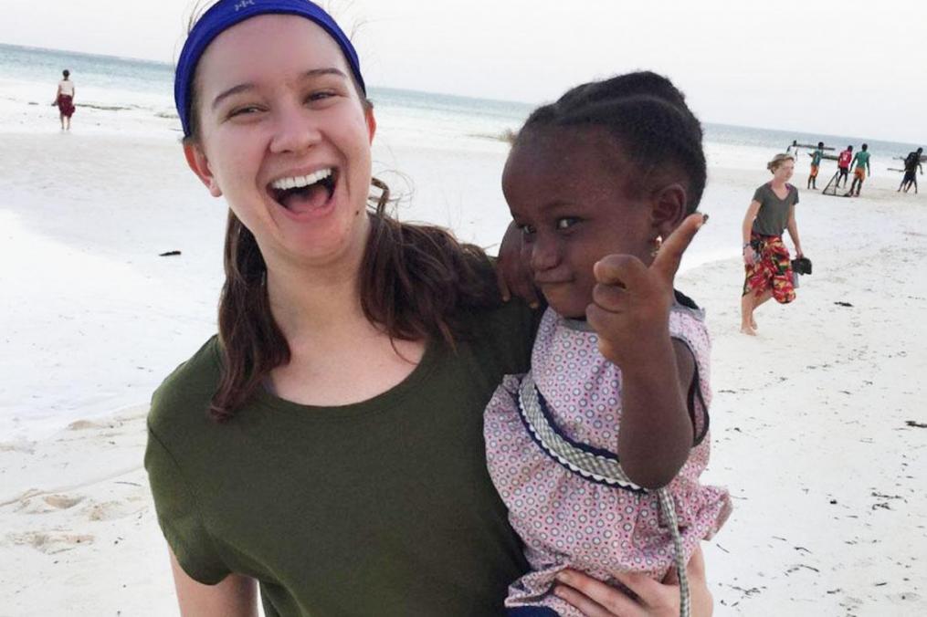 Tessa Alianell holding a little girl