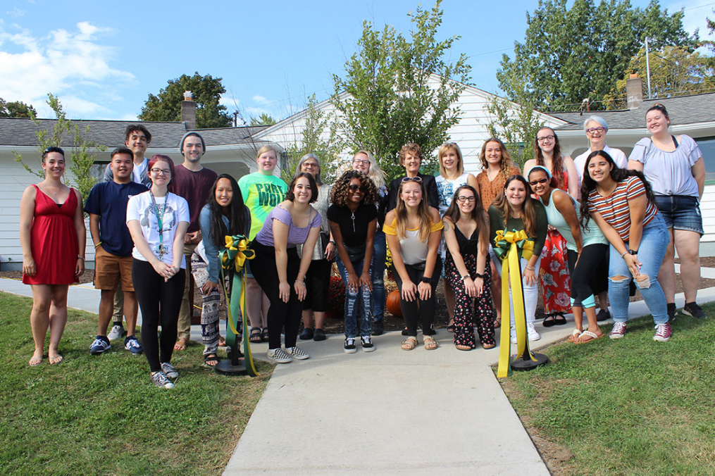 American Sign Language/ASL English Interpreting students and alumni pose outside the program's new facility after a formal ribbon-cutting on Saturday, Sept. 28.