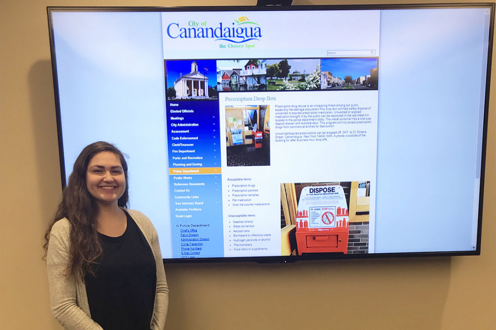  kellianne standing in front of a screen